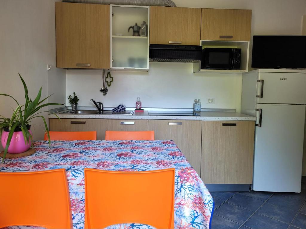 A kitchen or kitchenette at Residence Désirée