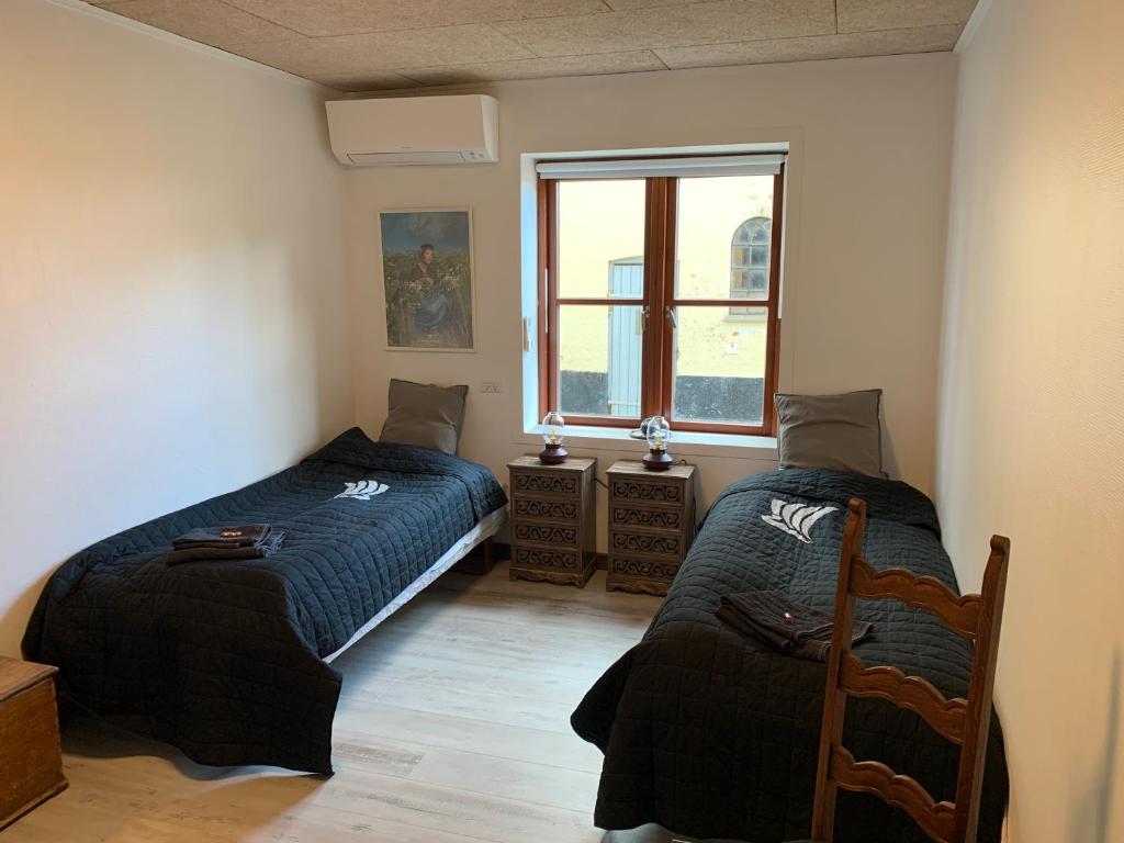 Postel nebo postele na pokoji v ubytování VikingBnB