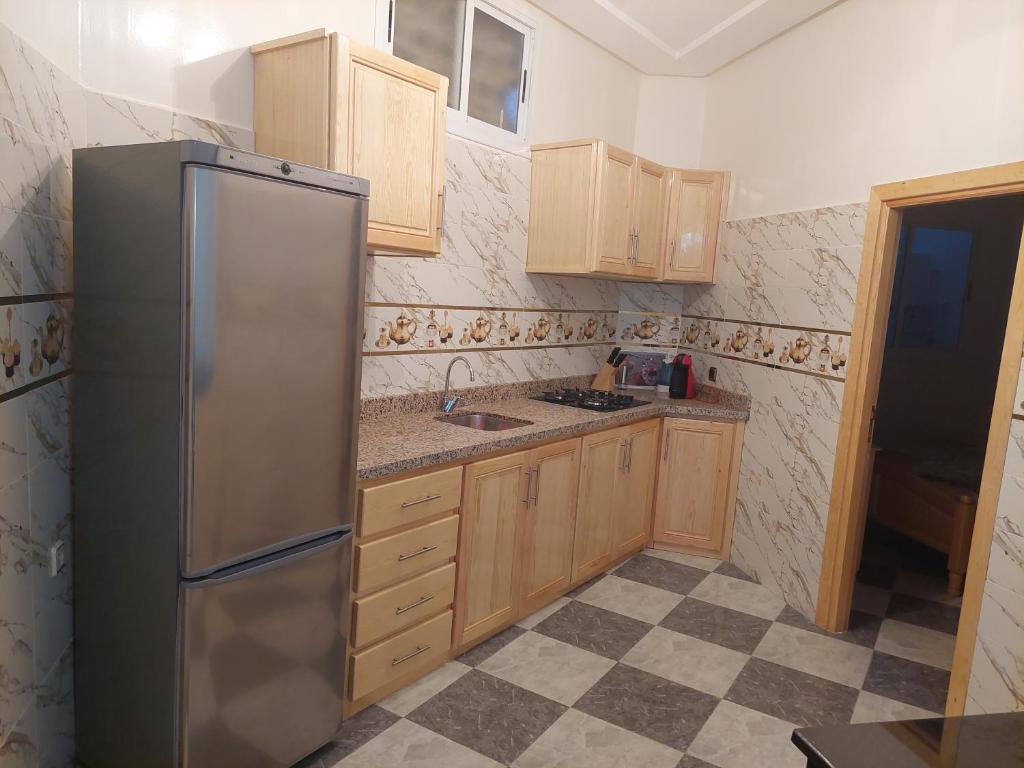 Kuchyň nebo kuchyňský kout v ubytování Appartement Al Hoceima