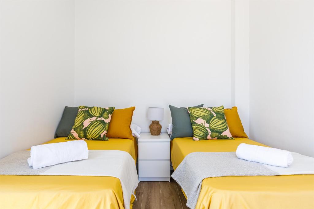Posteľ alebo postele v izbe v ubytovaní A&N Viñuela Luxury centro