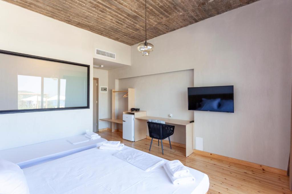 Postel nebo postele na pokoji v ubytování Toni Retzo Rooms