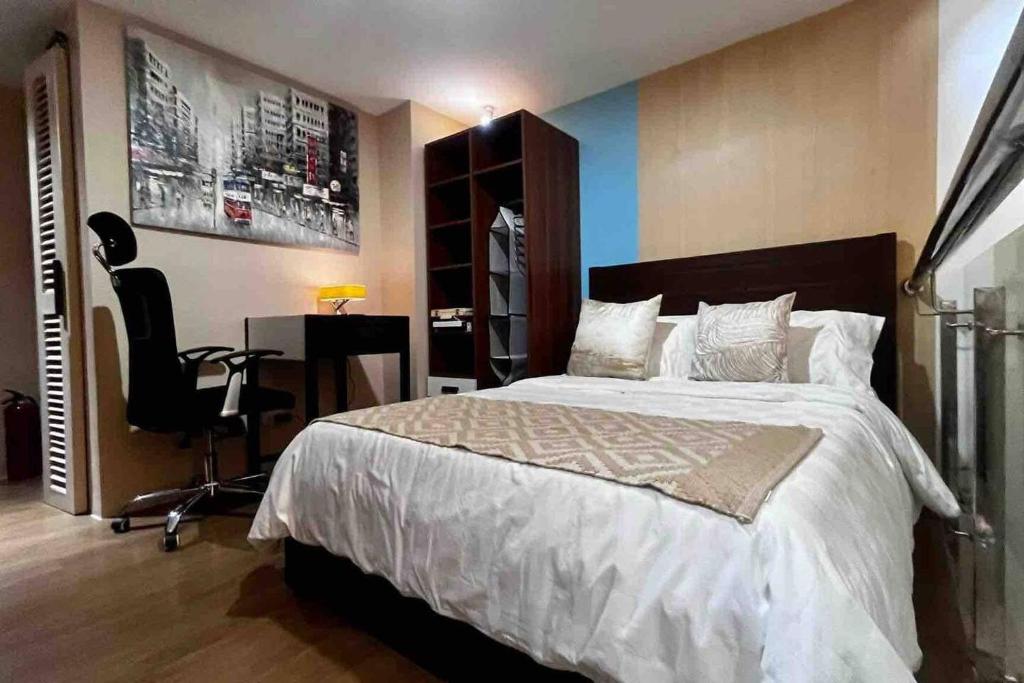 Postel nebo postele na pokoji v ubytování Loft Unit One Bedroom with terrace