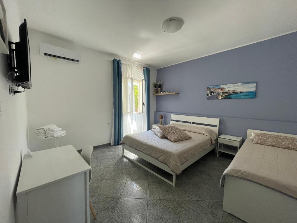 Posteľ alebo postele v izbe v ubytovaní A Casa di Giù B&B
