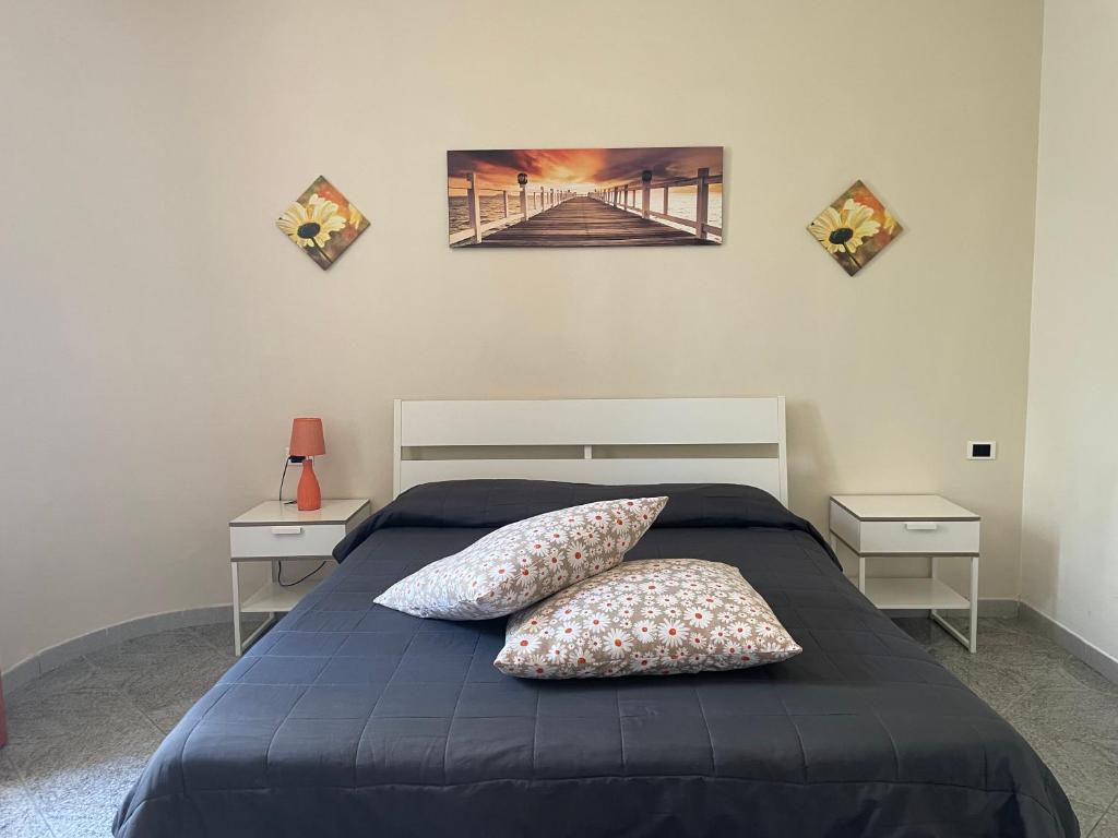 Posteľ alebo postele v izbe v ubytovaní A Casa di Giù B&B