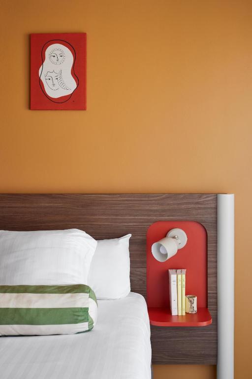 Postel nebo postele na pokoji v ubytování Hotel Abrial