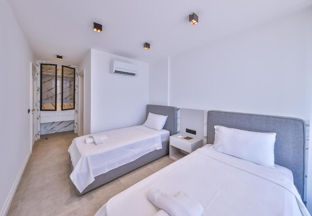Postel nebo postele na pokoji v ubytování Villa İnfinity Sky