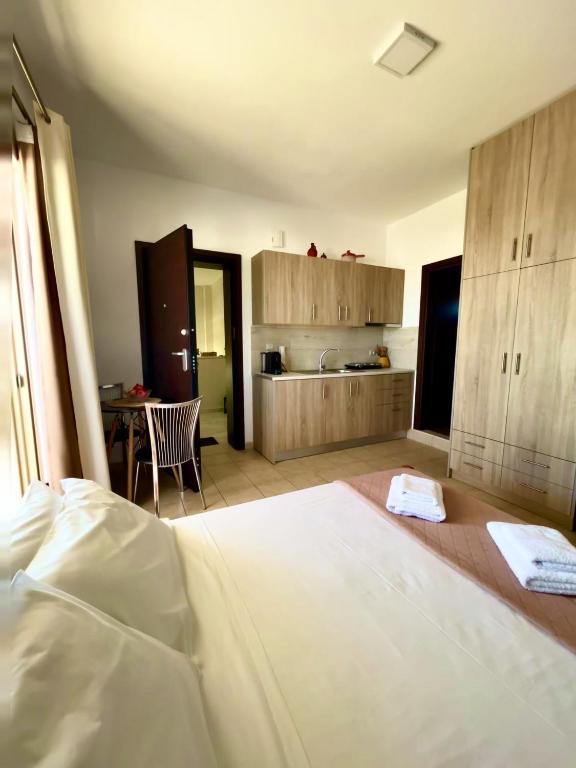 Posteľ alebo postele v izbe v ubytovaní Giotas house