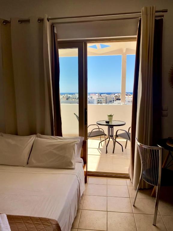 Posteľ alebo postele v izbe v ubytovaní Giotas house