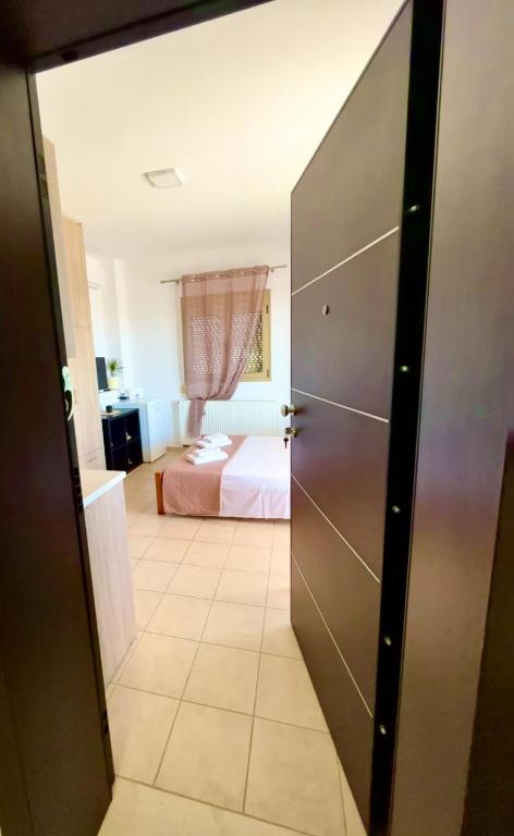 Posteľ alebo postele v izbe v ubytovaní Giotas house