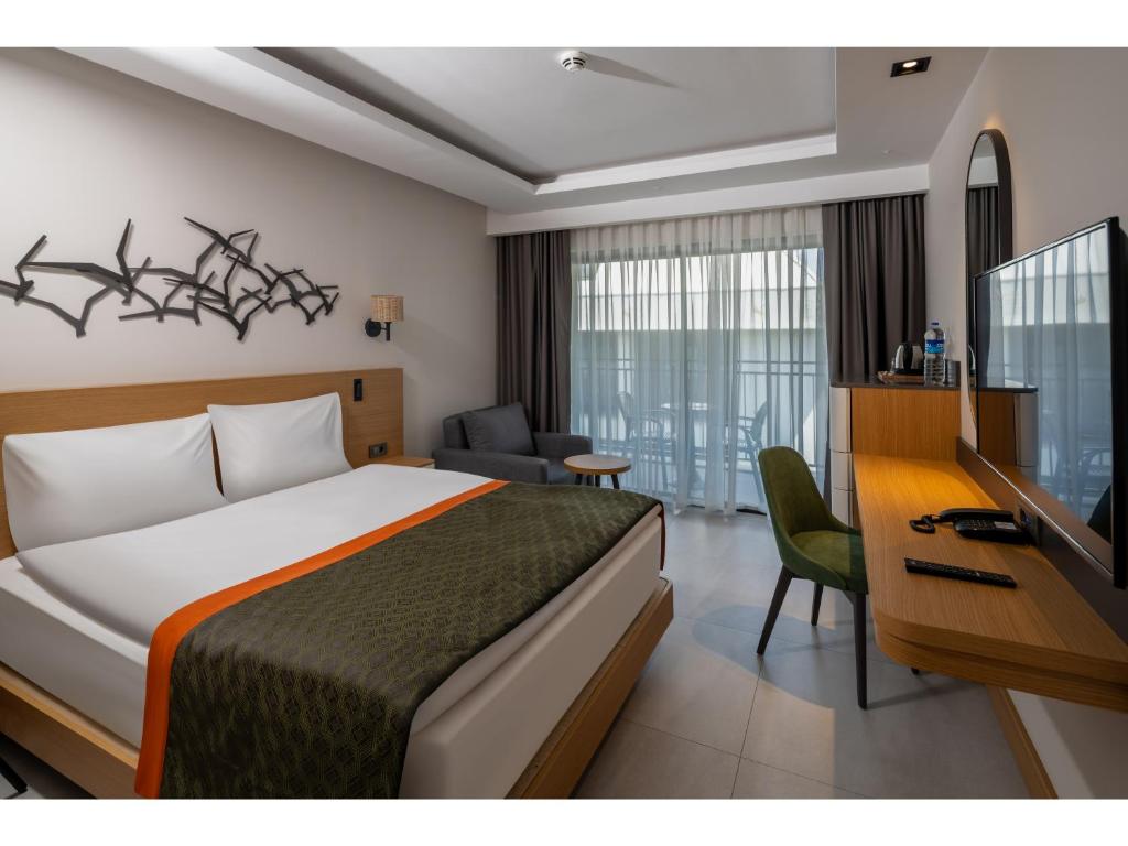 Postel nebo postele na pokoji v ubytování Swandor Hotels & Resorts - Kemer