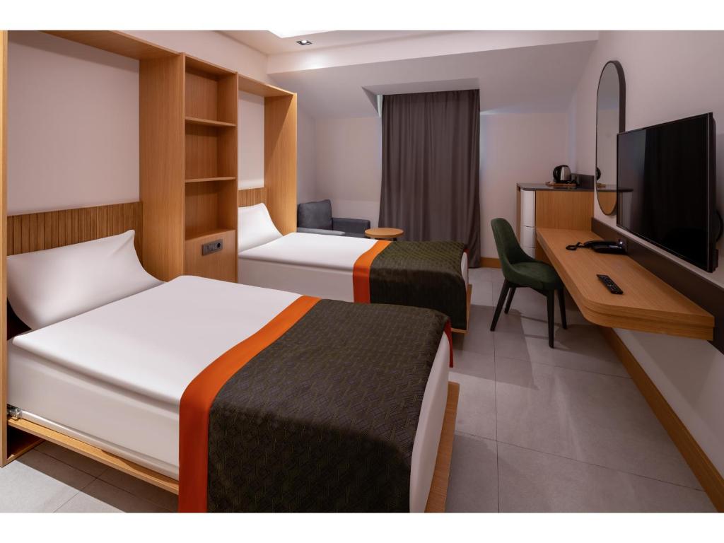 TV a/nebo společenská místnost v ubytování Swandor Hotels & Resorts - Kemer