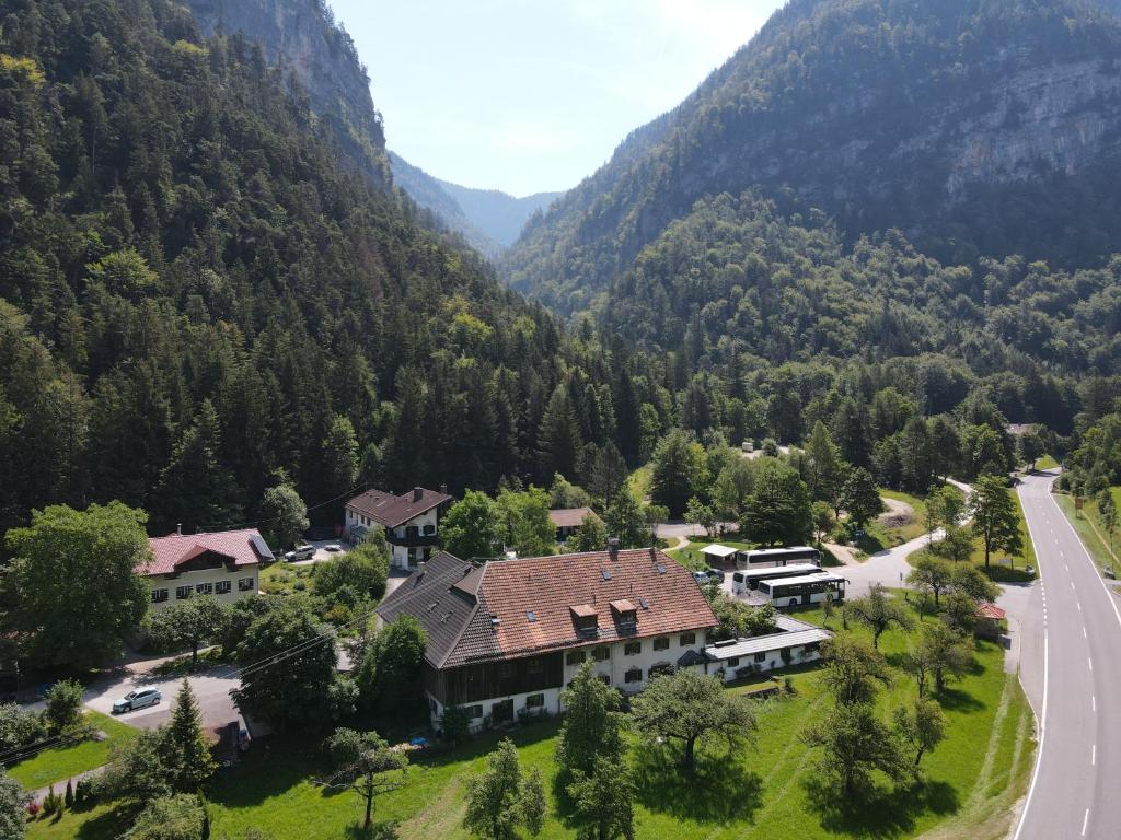 an aerial view of a house in the mountains at Pension Almhof Baumgarten in Bad Reichenhall