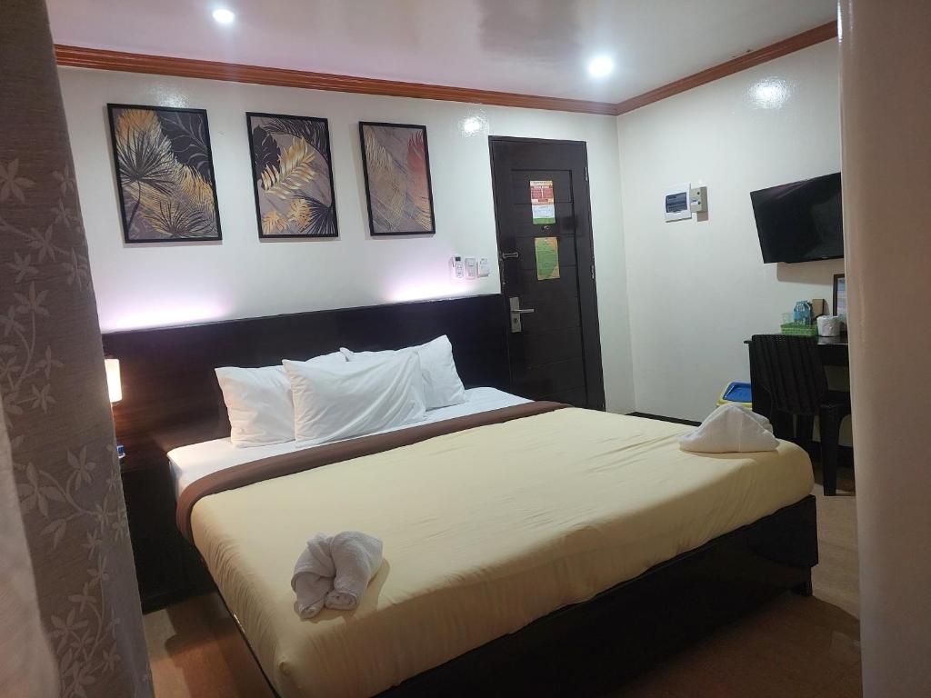 Postel nebo postele na pokoji v ubytování ISLAND VIEW SUITES