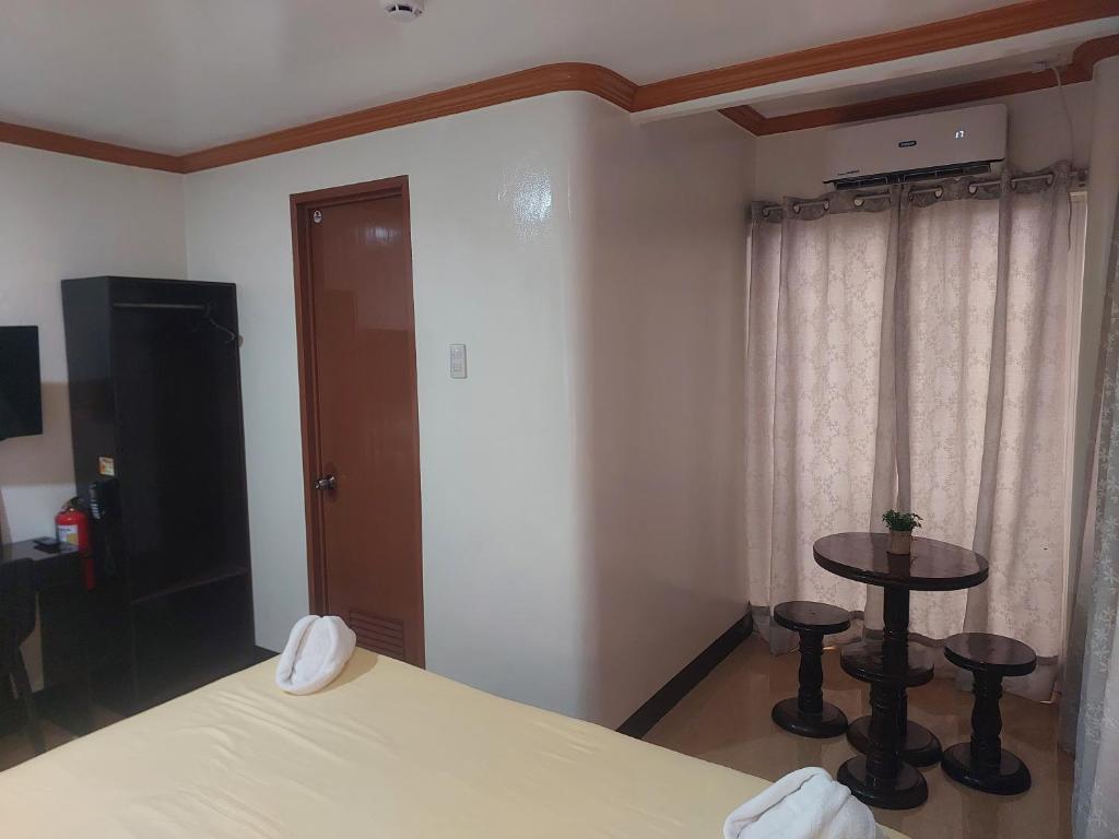 Postel nebo postele na pokoji v ubytování ISLAND VIEW SUITES