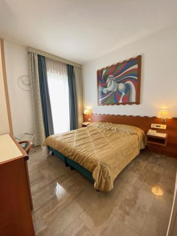 Postel nebo postele na pokoji v ubytování Hotel Europa