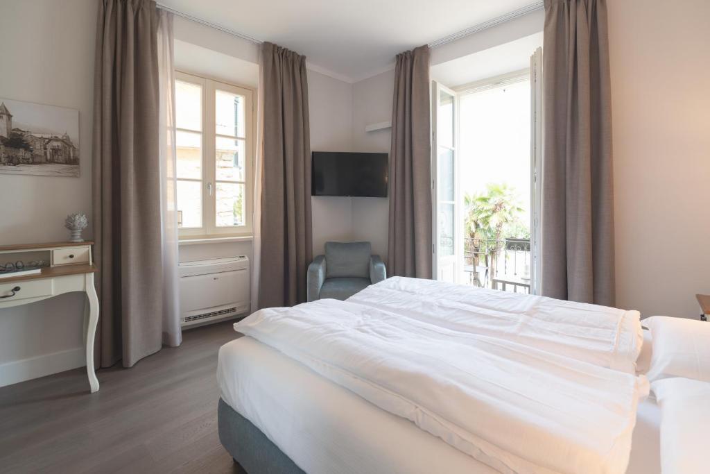 Postel nebo postele na pokoji v ubytování Rivalago B&B