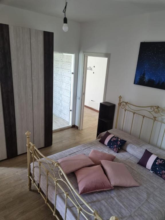 Postel nebo postele na pokoji v ubytování LA PACE DEGLI AGRUMI