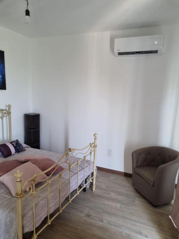 Postel nebo postele na pokoji v ubytování LA PACE DEGLI AGRUMI