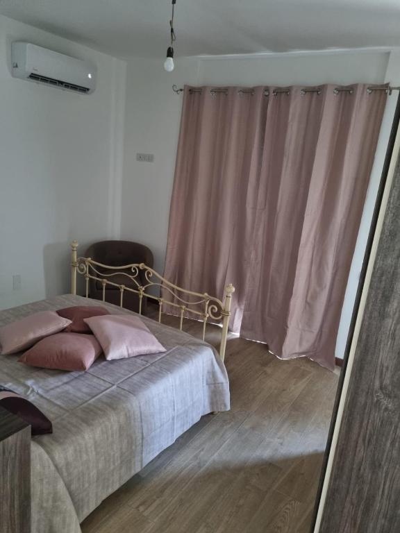 Postel nebo postele na pokoji v ubytování LA PACE DEGLI AGRUMI