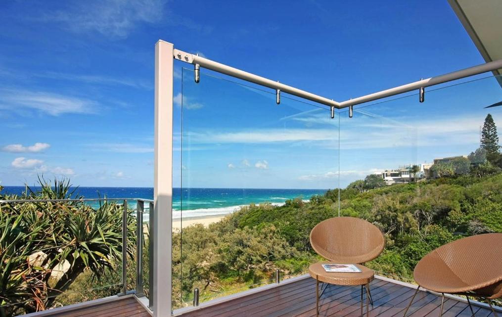 a balcony with a view of the ocean at 38 Seaview Terrace, Sunshine Beach in Noosa Heads