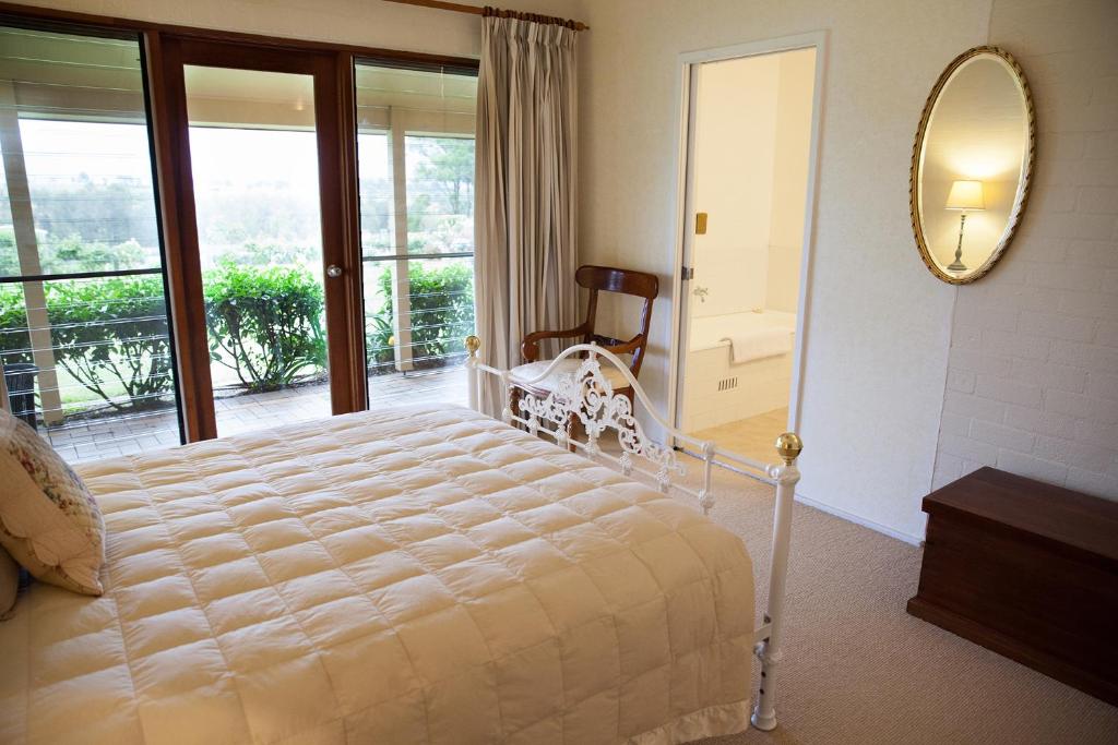 Postel nebo postele na pokoji v ubytování Burncroft Guesthouse