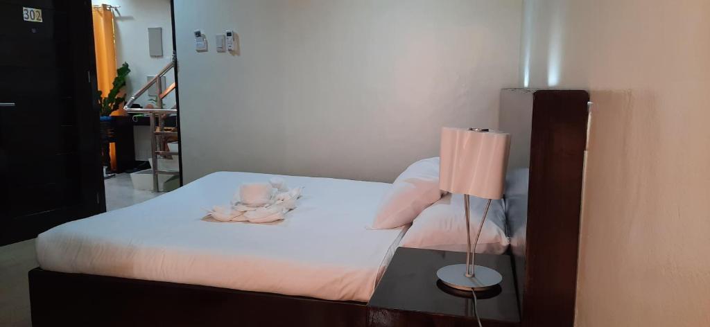 Postel nebo postele na pokoji v ubytování ISLAND VIEW SUITES