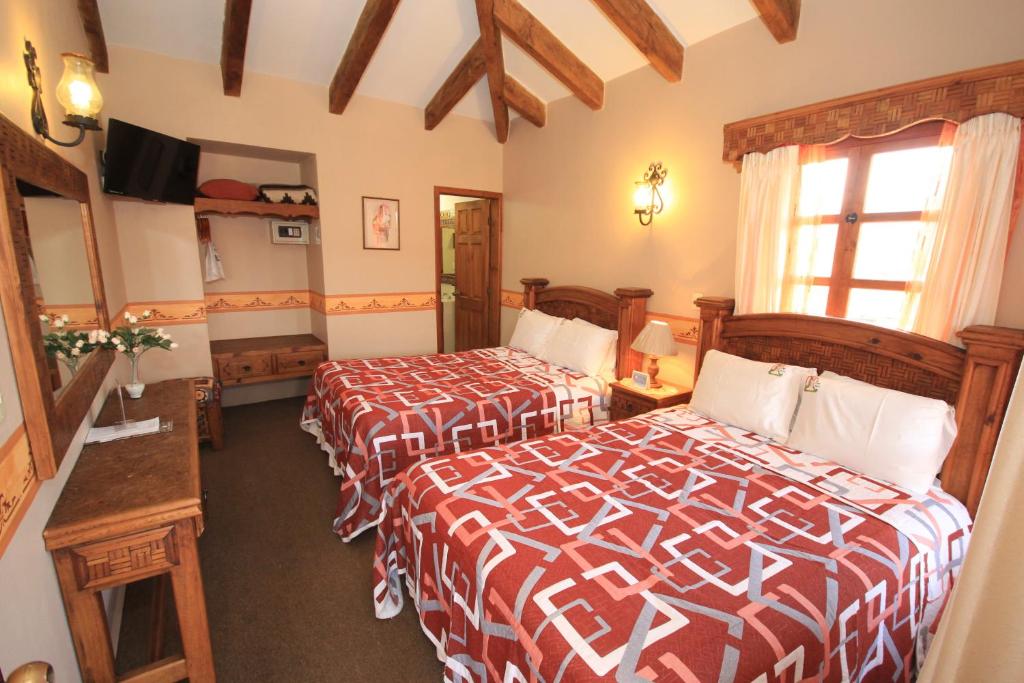 Hotel La Casa de Mamá - Habitación Doble Con Dos Camas Dobles