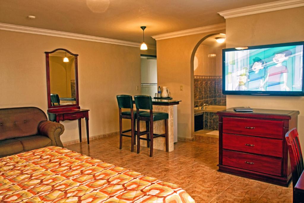 TV a/nebo společenská místnost v ubytování Hotel Milan Panama