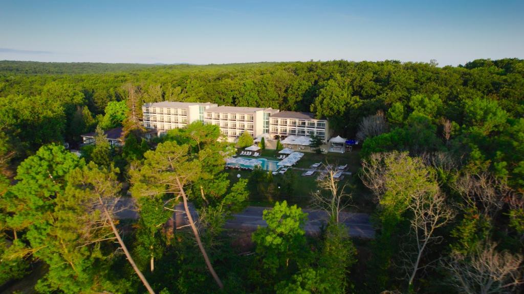 an aerial view of a hotel in the middle of a forest at St. Sofia Beach Hotel in Kiten