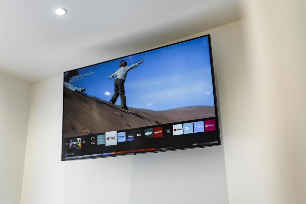 TV a/nebo společenská místnost v ubytování Mare Fuori B&B