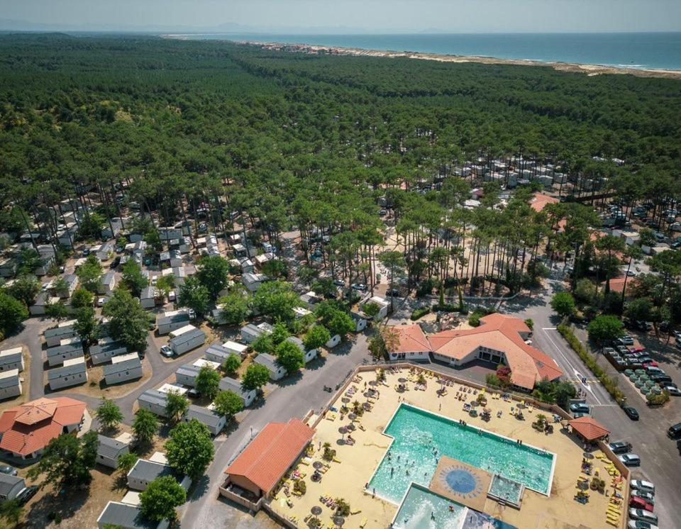 an aerial view of a resort with a swimming pool at Mobil home 4&#47;6 personnes in Seignosse