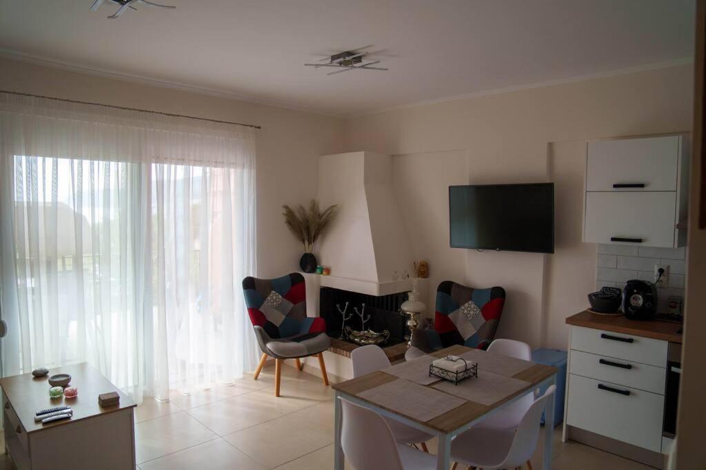 TV a/nebo společenská místnost v ubytování Mannou House
