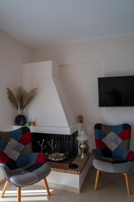 TV a/nebo společenská místnost v ubytování Mannou House
