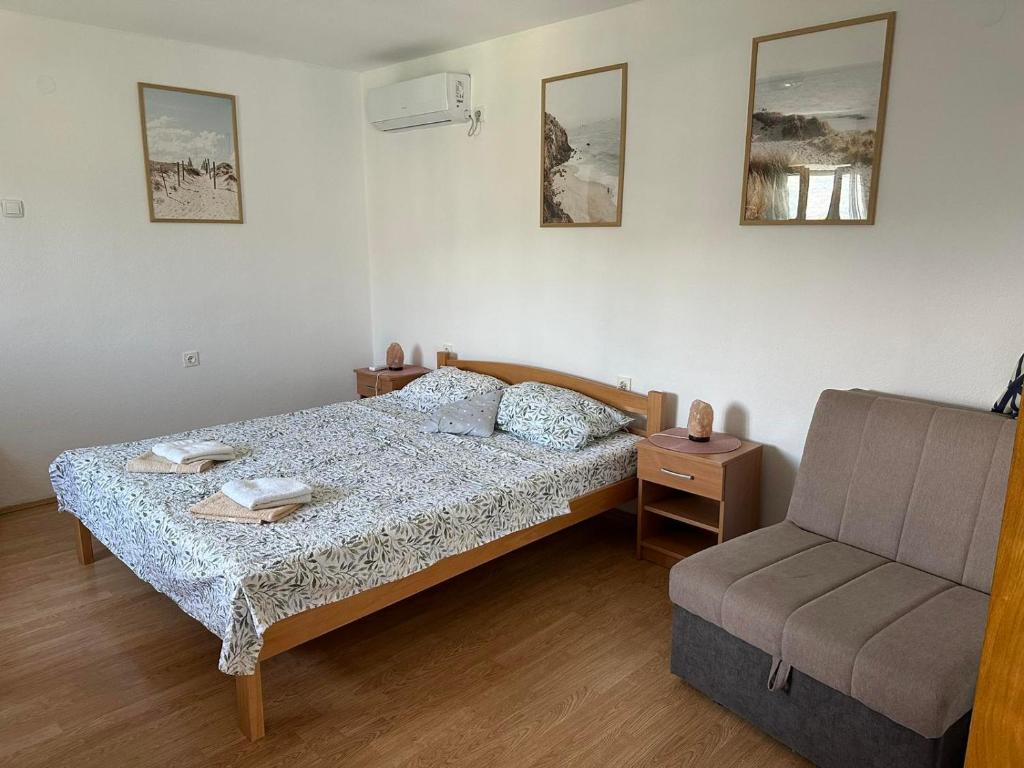 Ένα ή περισσότερα κρεβάτια σε δωμάτιο στο Vista Apartments
