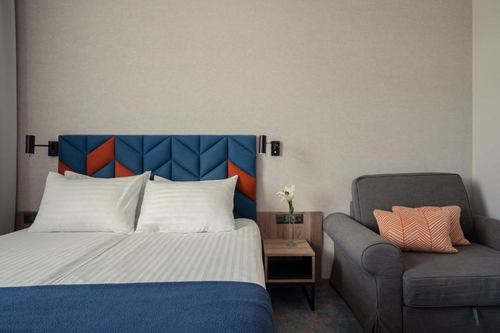 Postel nebo postele na pokoji v ubytování Hotel Faros Gdansk Airport
