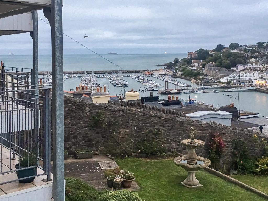 a view of a harbor with boats in the water at 3 Linden Court in Brixham