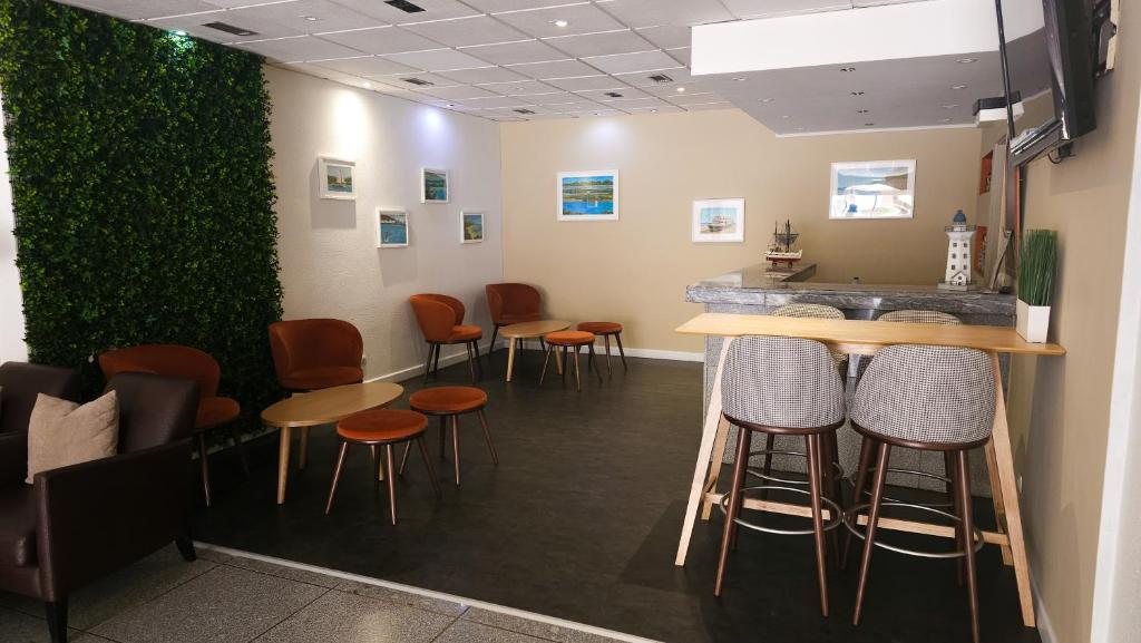 Телевизор и/или развлекательный центр в Hotel Laitau