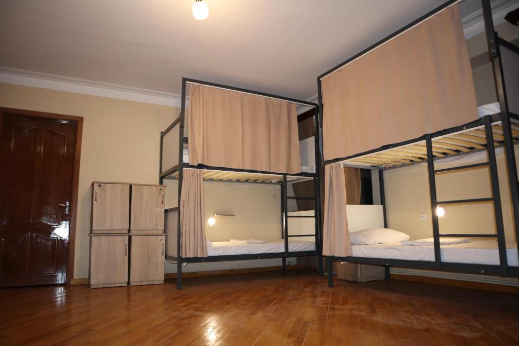 Postel nebo postele na pokoji v ubytování Sweet Sleep hostel
