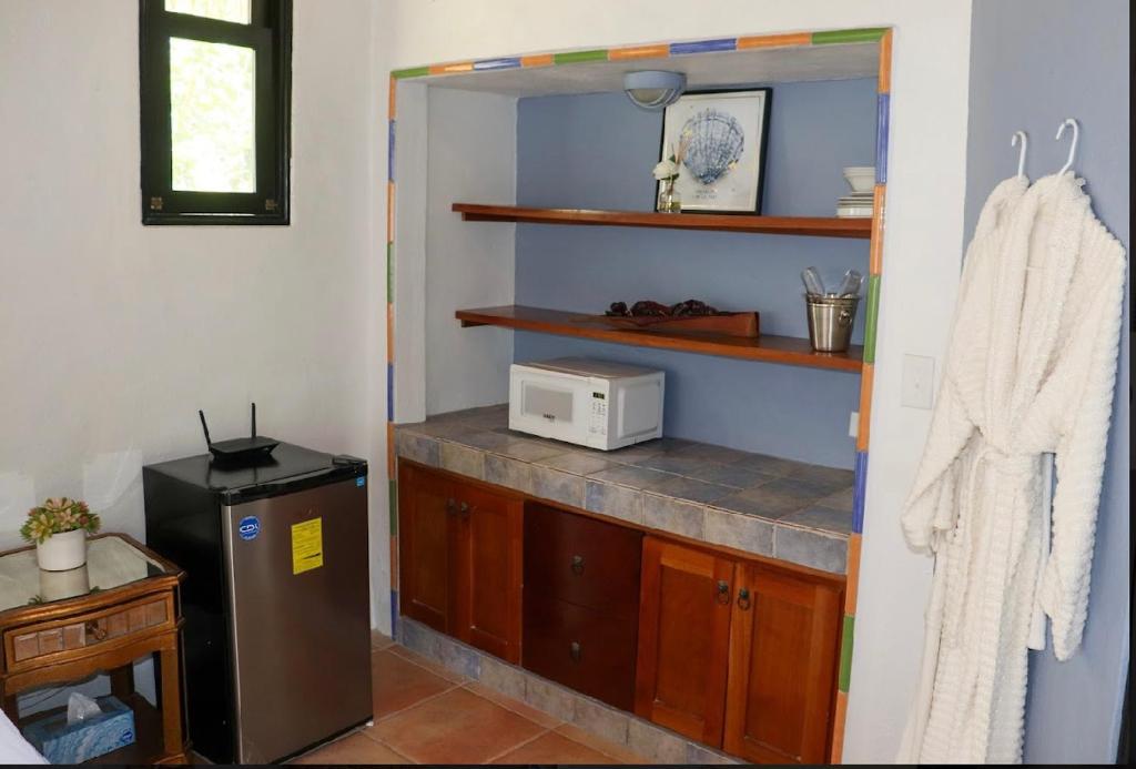 Kuchyň nebo kuchyňský kout v ubytování Villa La Fortuna
