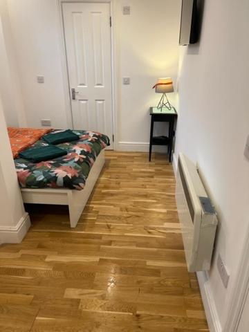 Cama ou camas em um quarto em Amazing Flat 3 in Battersea