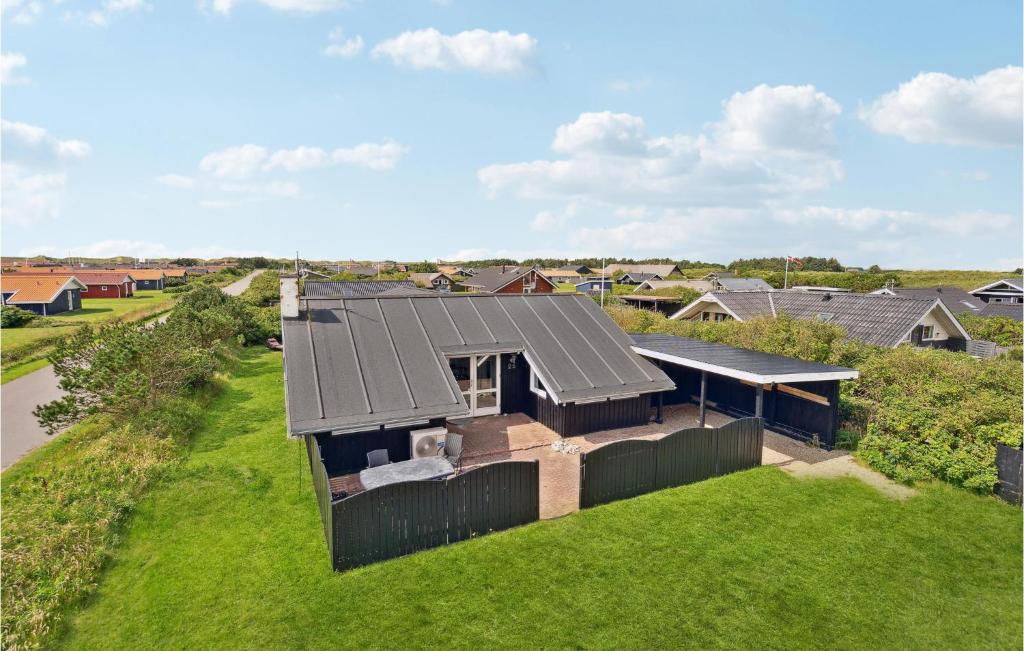 an overhead view of a house with a roof at Beautiful Home In Harbore With Wifi in Harboør