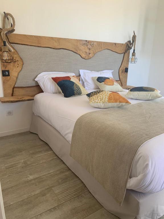 Postel nebo postele na pokoji v ubytování VILLA MACAGNA
