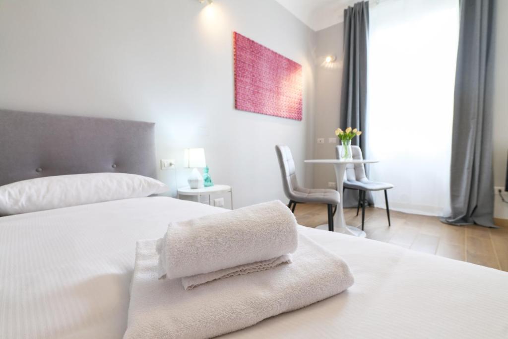 Ένα ή περισσότερα κρεβάτια σε δωμάτιο στο PrimoPiano - Meda 6