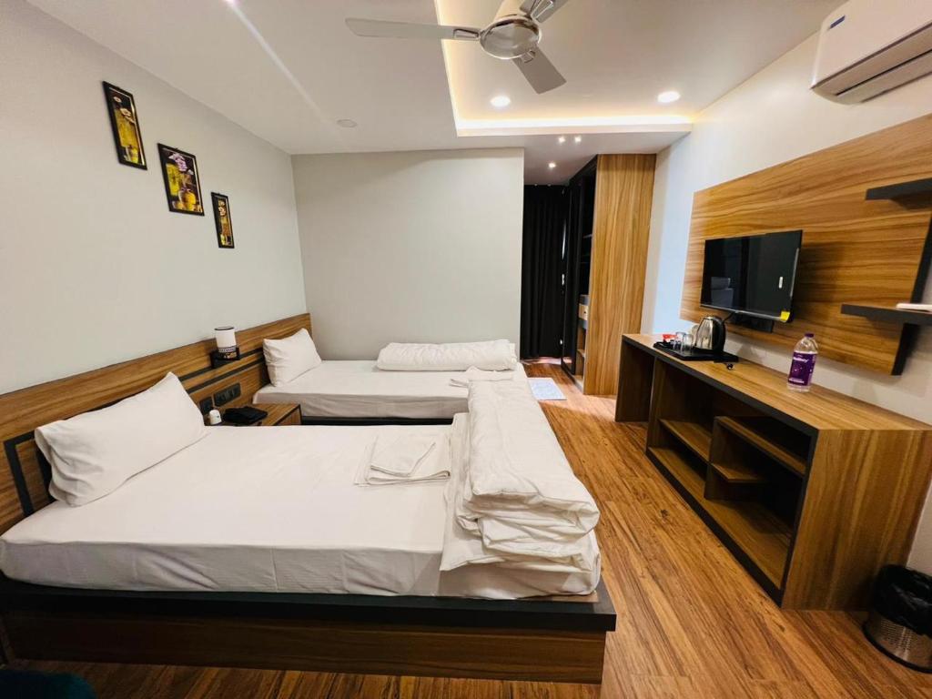 Postel nebo postele na pokoji v ubytování HOTEL ROYAL VANILLA