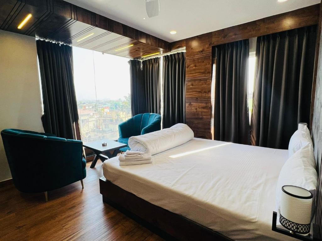 Postel nebo postele na pokoji v ubytování HOTEL ROYAL VANILLA