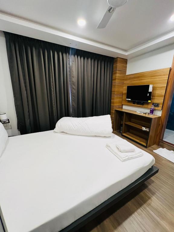 Postel nebo postele na pokoji v ubytování HOTEL ROYAL VANILLA