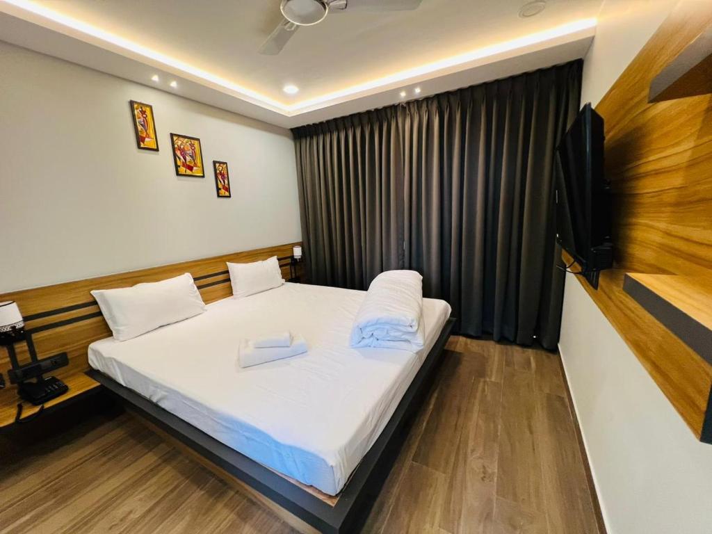 Postel nebo postele na pokoji v ubytování HOTEL ROYAL VANILLA