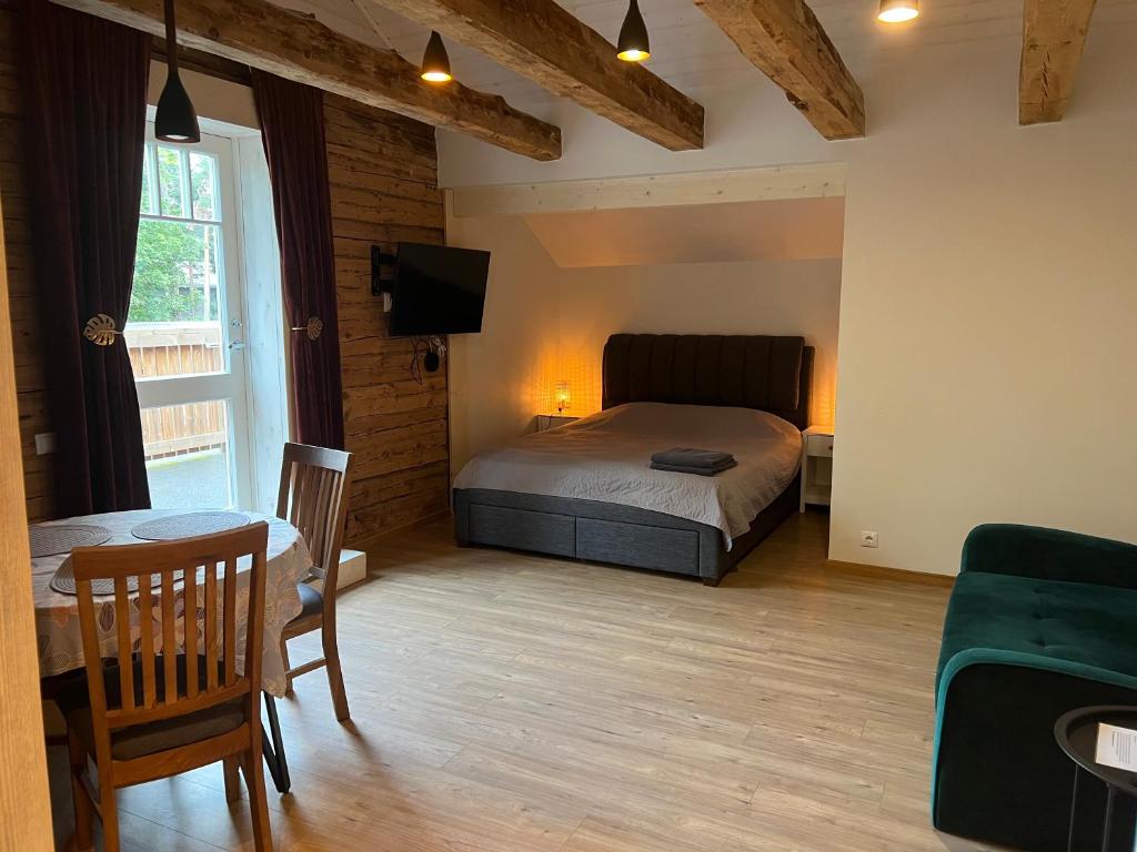 Postel nebo postele na pokoji v ubytování Nõmme Apartments