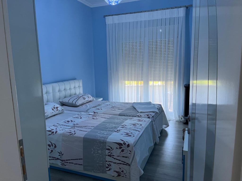 Postel nebo postele na pokoji v ubytování Vila Gregor