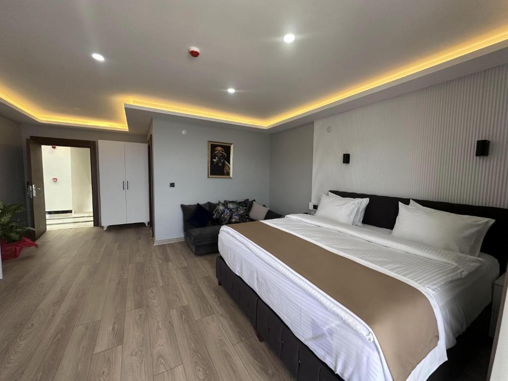 Кровать или кровати в номере Beyaz Köşk Hotel & Cafe